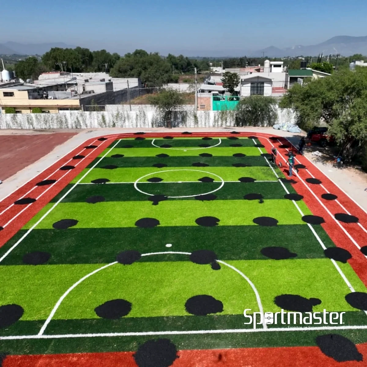 Cancha de fútbol 5 con pasto sintético en Colegio Jean Piaget, Actopan