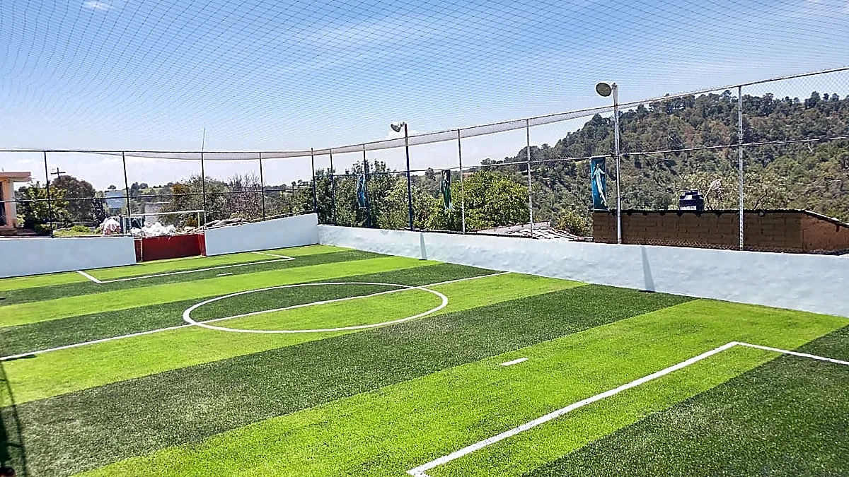 Cancha de fútbol 7 con pasto sintético en Campo Deportivo Titanes de Tlahuapan