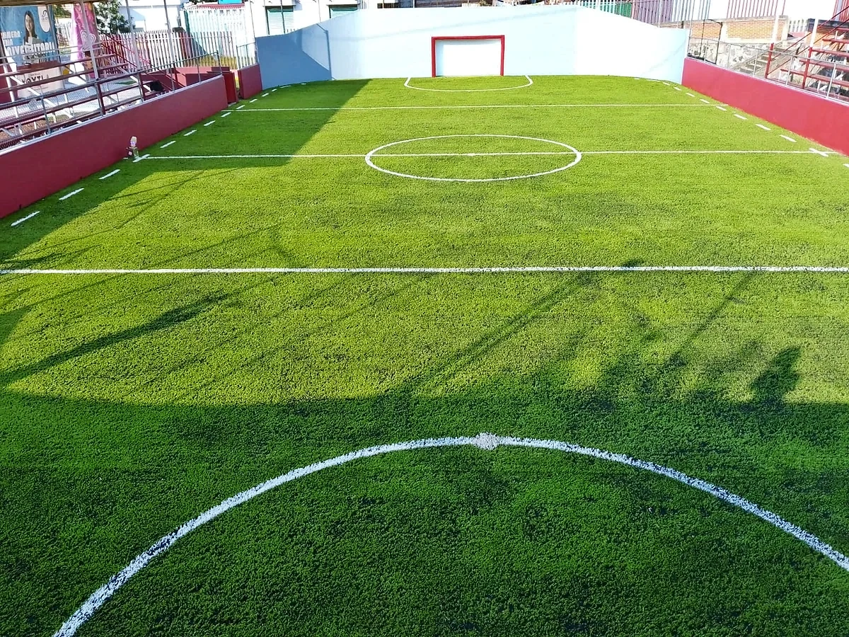 Cancha de fútbol rápido con pasto sintético en San Miguel Xoxtla, Puebla